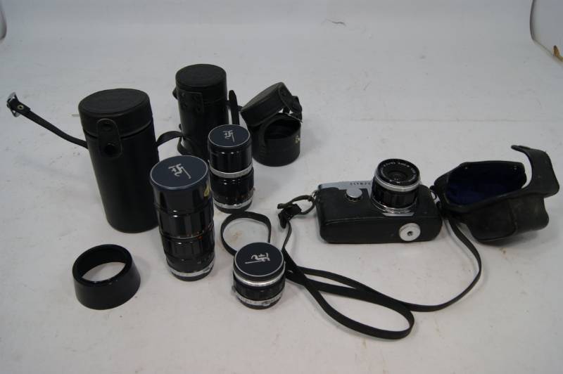 lot 35 image: Vintage Olympus Camera and 3 Lens