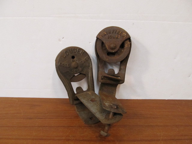 lot 104 image: Antique Cast Iron Pulleys