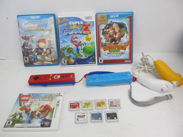 lot 132 image: Group of assorted Nintendo Games Wii Controllers etc