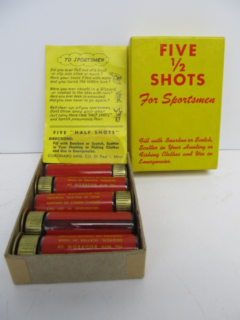 lot 121 image: Vintage 1950s Half Shot Shotgun Shell WhiskeyLiquor Flasks
