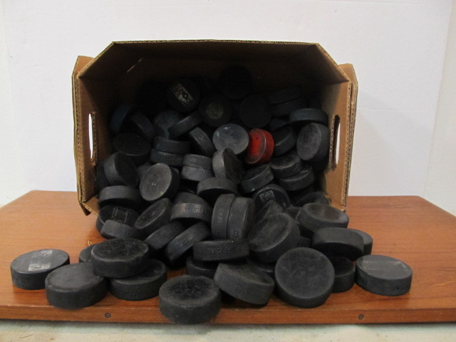 lot 236 image: LARGE Lot of Hockey Pucks