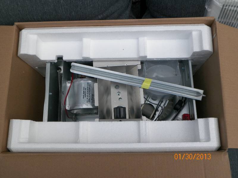 lot 41 image: NuTone - 70 CFM Ceiling Bathroom Exhaust Fan with Light and 1300-Watt Heater