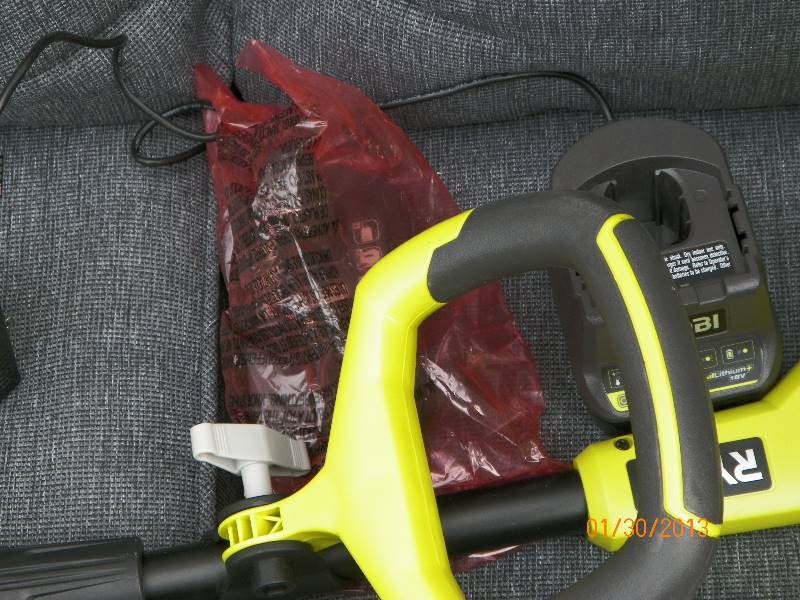 lot 50 image: New IN BOX - Ryobi - ONE 9 in. 18-Volt Lithium-Ion Cordless Edger - 1.3 Ah Battery and Charger Included
