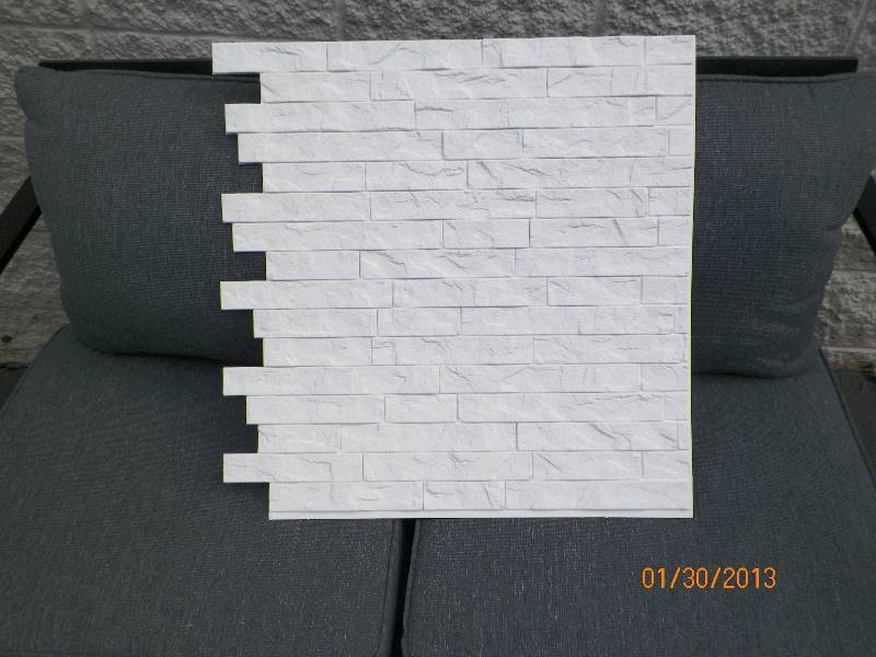 lot 94 image: Innovera Dcor by Palram - 24 x 24 Ledge Stone Decorative Vinyl Wall Paneling in White (9-Pieces) - 1 CASE