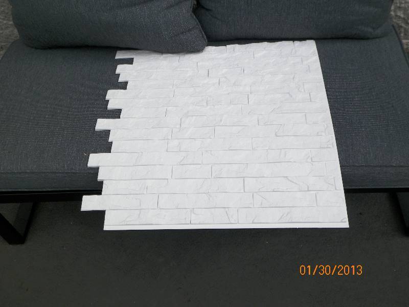lot 95 image: Innovera Dcor by Palram - 24 x 24 Ledge Stone Decorative Vinyl Wall Paneling in White (9-Pieces) - 1 CASE