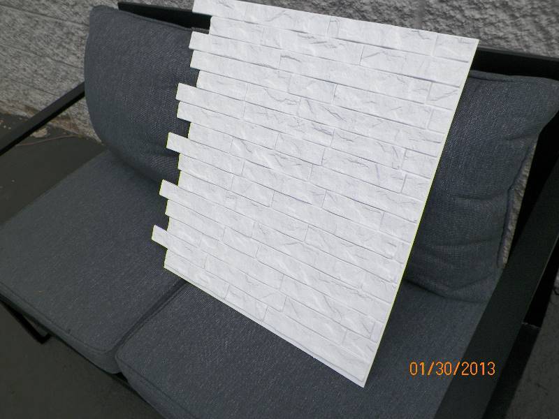 lot 97 image: Innovera Dcor by Palram - 24 x 24 Ledge Stone Decorative Vinyl Wall Paneling in White (9-Pieces) - 1 CASE