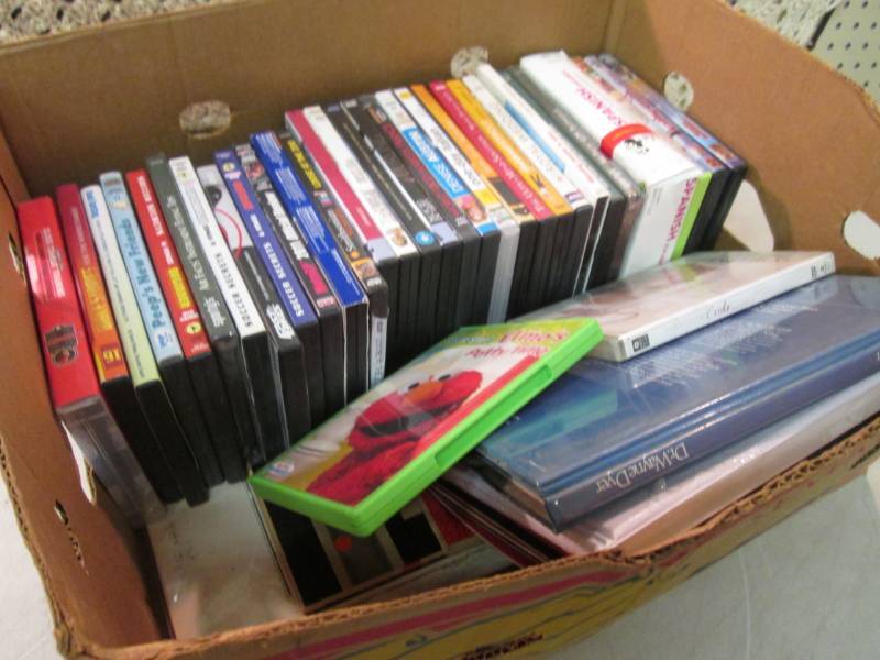 Lot of DVDs etc.  C-3...