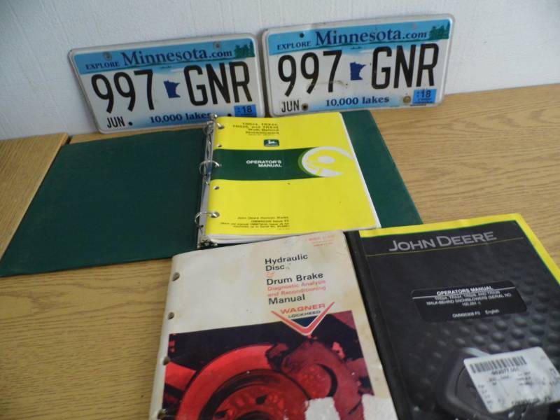 lot 37 image: John Deere Manuals - License Plates