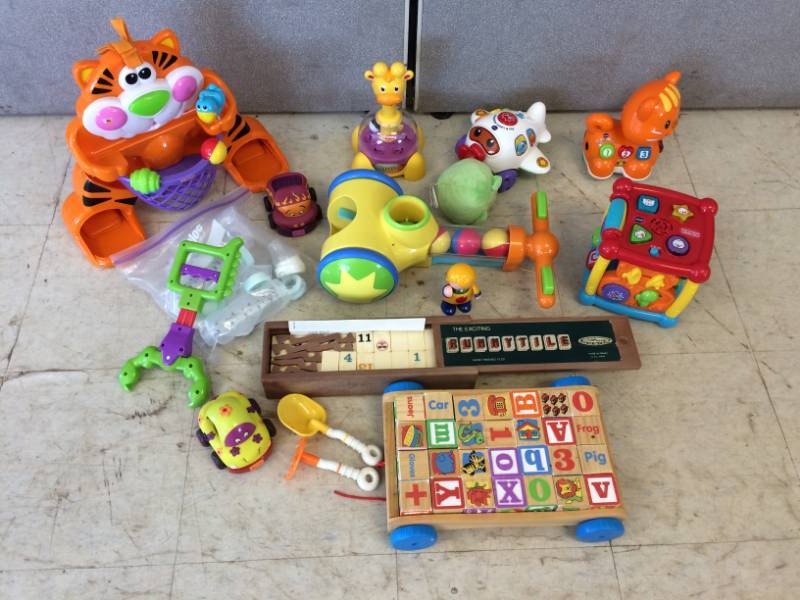 lot 179 image: Assorted Baby Toys and Playtex Bottles