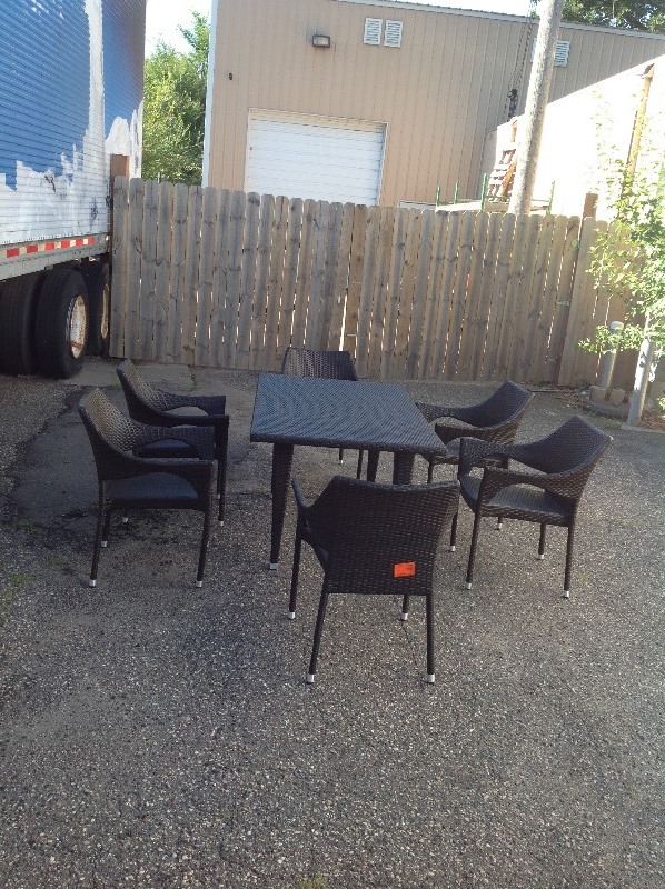 Noble House Cliff Multi-Brown 7-Piece Wicker Outdoor Dining Set in good conditions