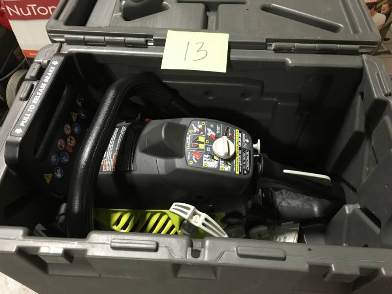 lot 13 image: RYOBI 16 in. 37cc 2-Cycle Gas Chainsaw with Heavy-Duty Case in good condition