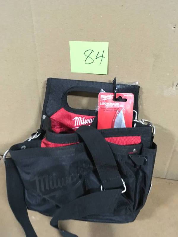 lot 84 image: Milwaukee 15-Pocket Electricians Work PouchHolster with Quick Adjust Belt with 3 in. Lockback Knife in good condition