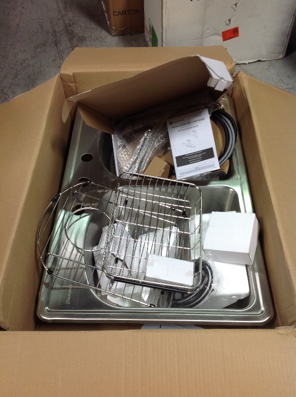 Glacier Bay All-in-One Drop-In Stainless Steel 33 in. 3-Hole Double Bowl Kitchen Sink whit small damage on the corned