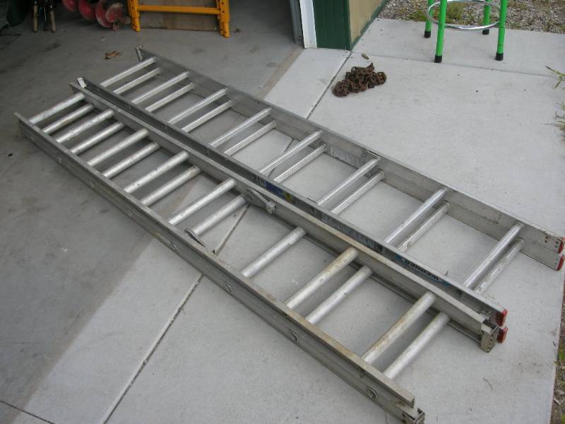 lot 51 image: Werner and Other 16 Aluminum Extension Ladders