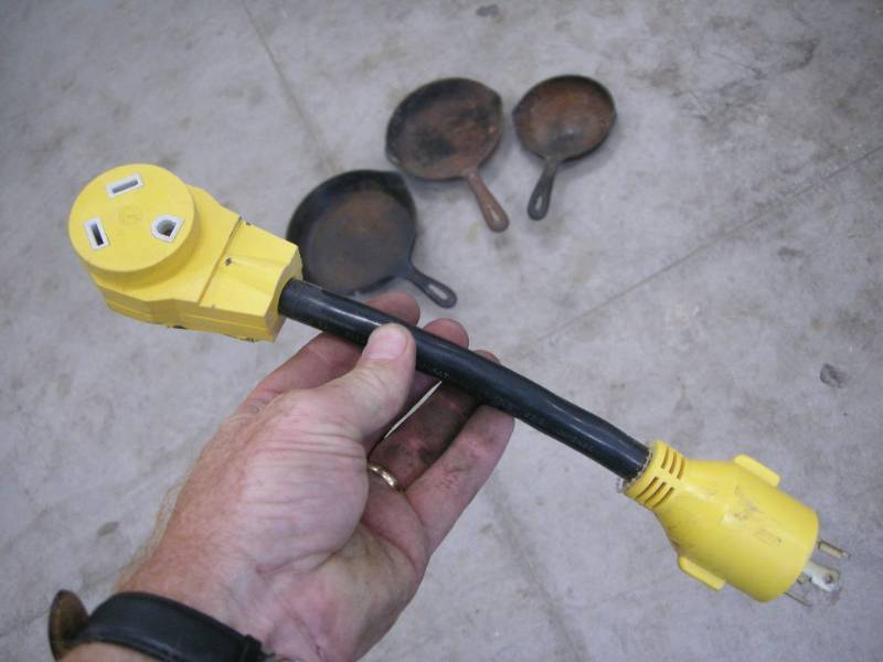 lot 113 image: RV Power Cord Adapter