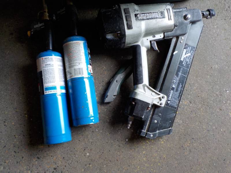lot 15 image: Sure Bonder Nailer and Propane Tank...