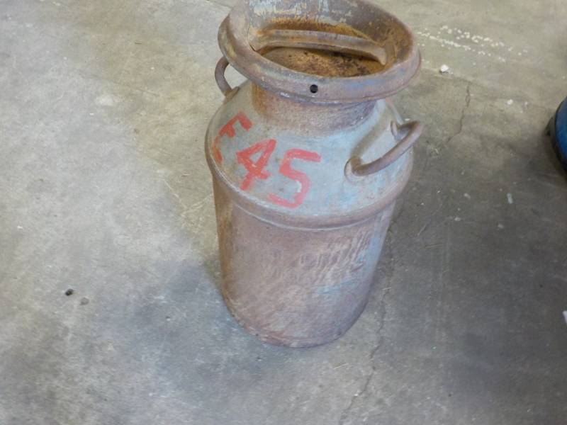 lot 79 image: Rusty Milk Can and Cover...