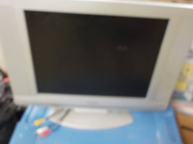 lot 101 image: 20 Inch Sylvania TV with Cords...