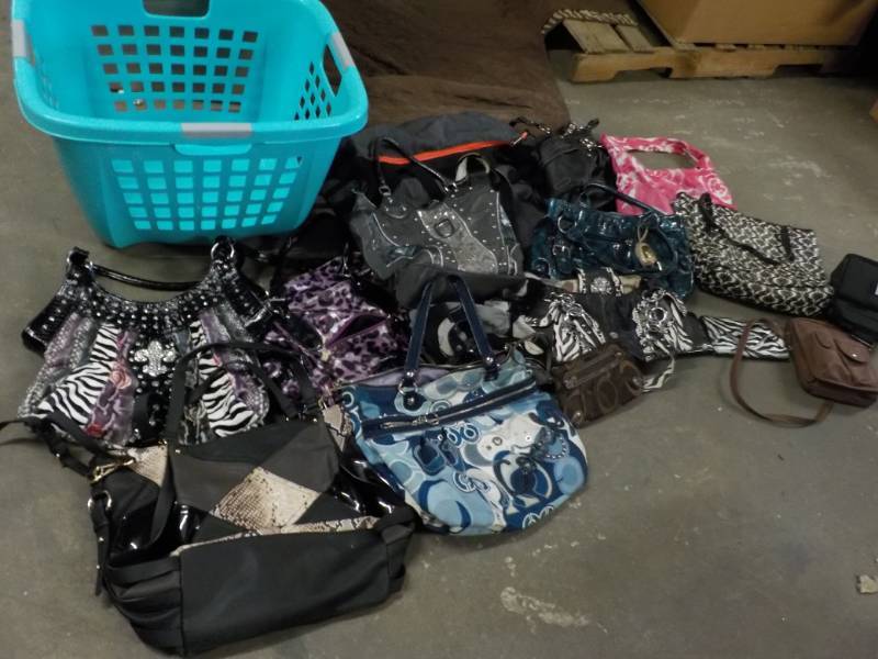 lot 113 image: Laundry Basket with all Purses and ...