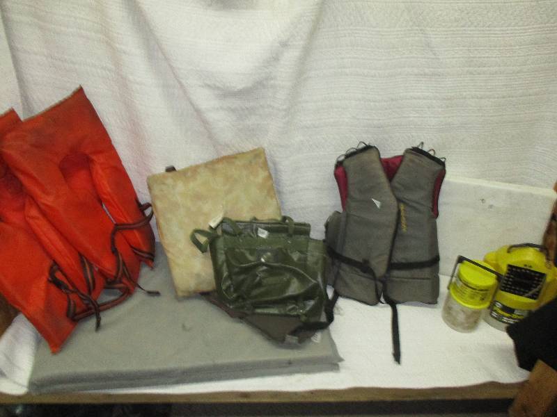 life jackets, minnow buckets, cushion