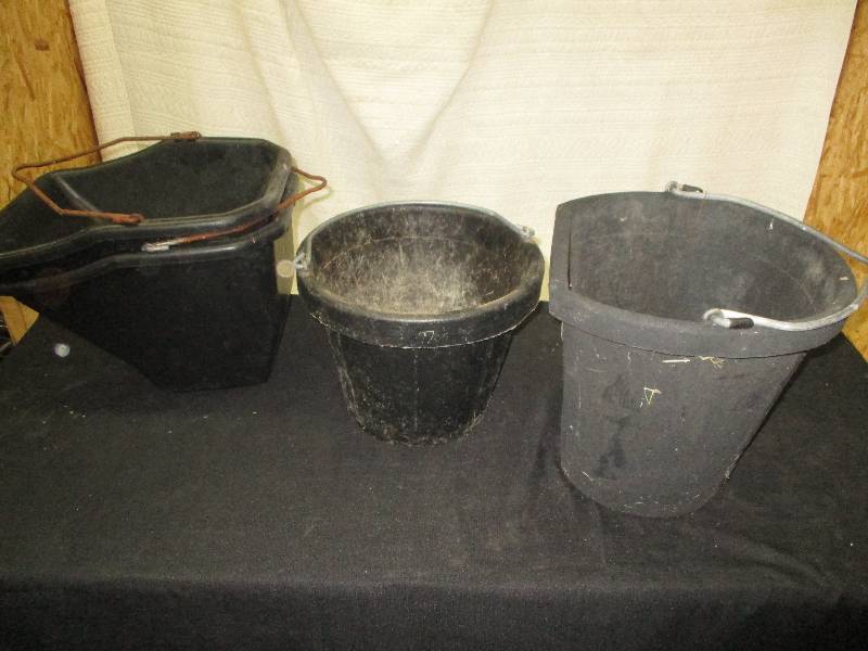 rubber feed and water buckets
