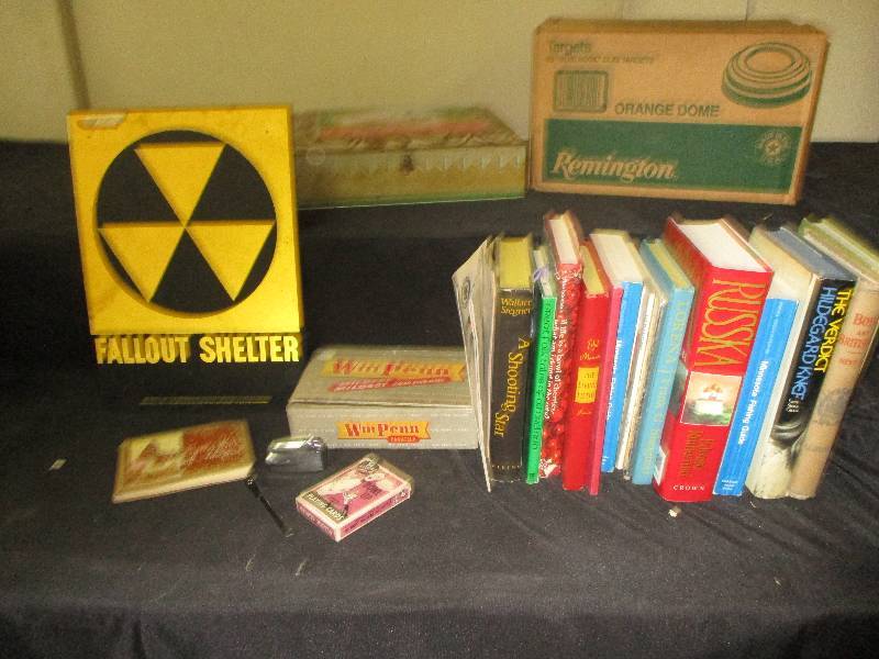 metal sign, clay pigeons, cig box, bpooks, cig lighter,