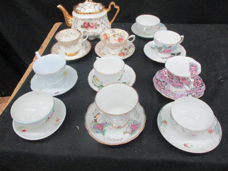 cups and saucers, t pot,
