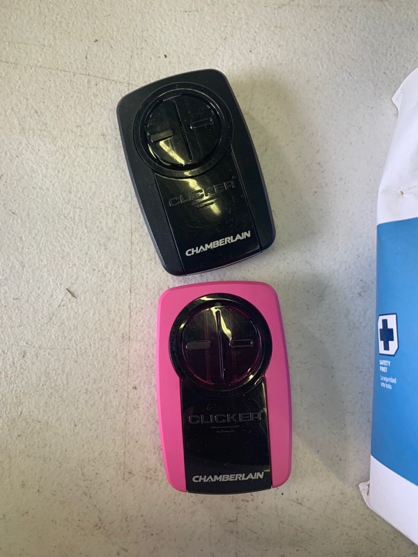 lot 25 image: Chamberlain Lot- Internet Gateway, Safety Sensors, Garage Door Clickers, Garage Door belt, as is, untested