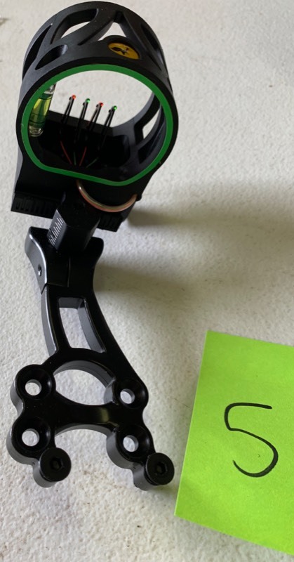 lot 56 image: Trophy Ridgid Joker 4 Archery Sight- Untested may be salvage and Thermos Vacuum Insulated food jar