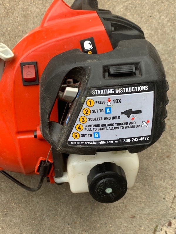 lot 72 image: Lot of 2- Homelite gas trimmer heads- no attachments included