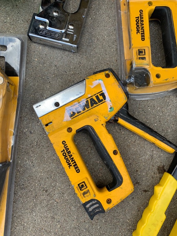 lot 86 image: Lot of- 3 staplers and 2 riviters- Dewalt and stanley- untested salvage AS IS