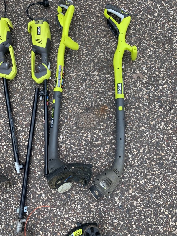 lot 12 image: Salvage- Ryobi Trimmer parts some electric some battery power