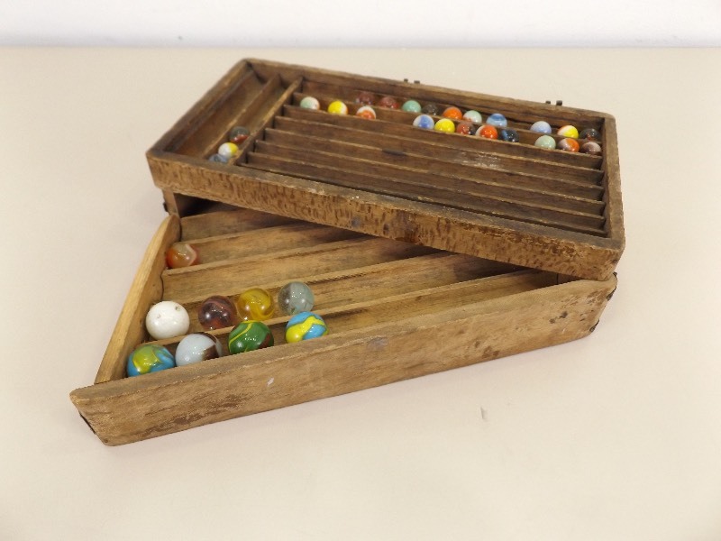 lot 77 image: Antique Marbles in VERY COOL Wood Marble Box