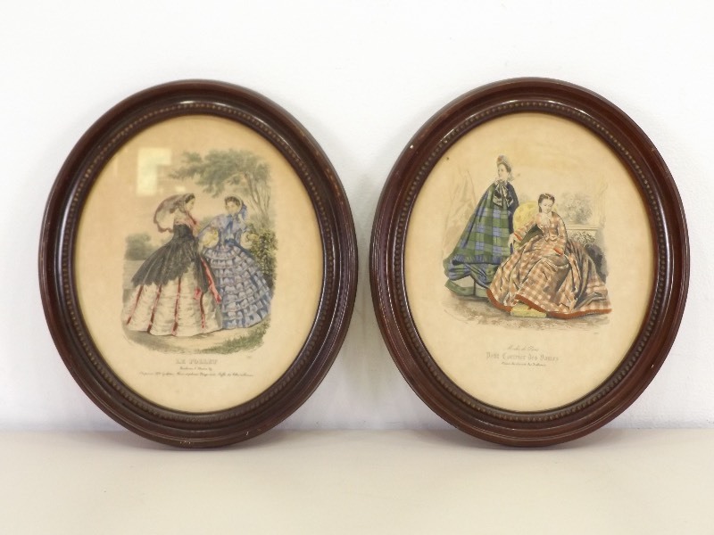 lot 94 image: 2 Antique Victorian Wood Oval Framed Fashion Plates