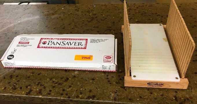 lot 565 image: The Bread Pal Bread Slicer & Pan Saver Pan Liners
