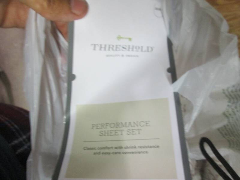 Floral queen bed sheet open package...