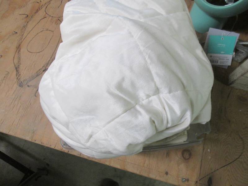 Ivory weighted blanket open package...
