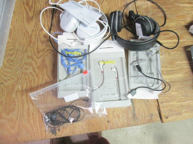 lot of mixed pair of headphones son...