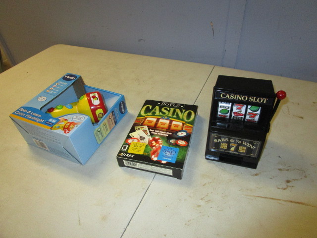 lot 354 image: VTECH LEARNING LIGHT, HOYLE CASINO PC GAME, AND MINI SLOT MACHINE