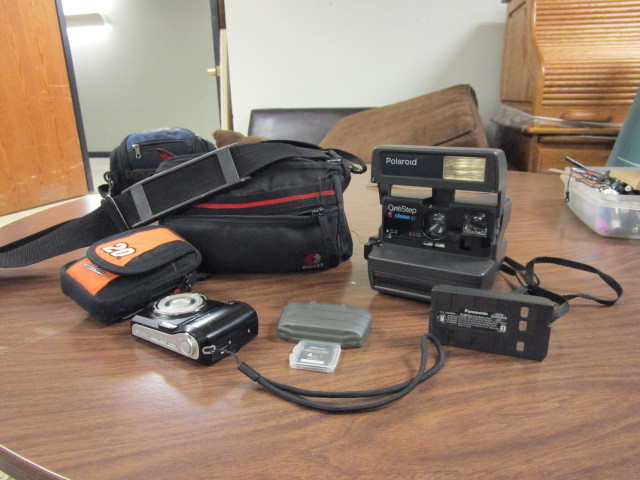 lot 369 image: KODAK AND POLAROID CAMERAS