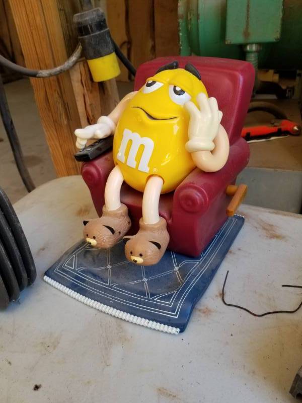 lot 1255 image: 1999 M&M Yellow Candy Man Dispenser with Recliner