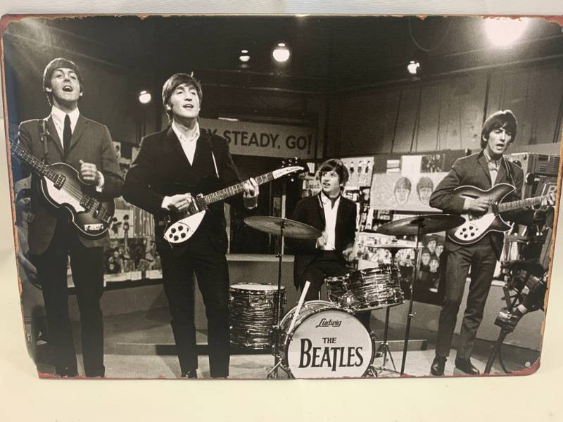 lot 34 image: The Beatles Metal Sign