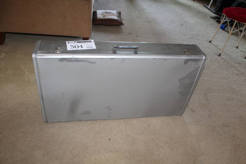 lot 504 image: Metal Suitcase