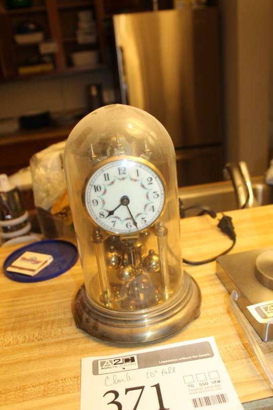 lot 371 image: Table Clock Under Glass