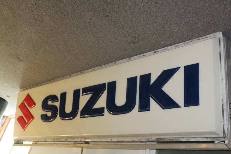 lot 82 image: Dualite Suzuki Double Sided Commercial Electric Sign with 15ft. Pole