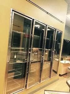 lot 14 image: Walk-in freezer, four glass door front, inside compartment size 11x8x7H, complete w-floor, 208 volts, 1 ph, Heatcraft evaporator, 208 volts, 11.7 amps-3