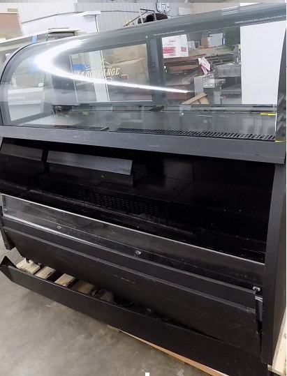lot 24 image: Structural Concept, Mod #SB5766.3923A, curved glass refrigerated merchandiser,  220 volts, 20 amps, 1 ph, 66.5x33x58H, NOTE-Missing one of two rear sliding glass doors-2Runs Cools