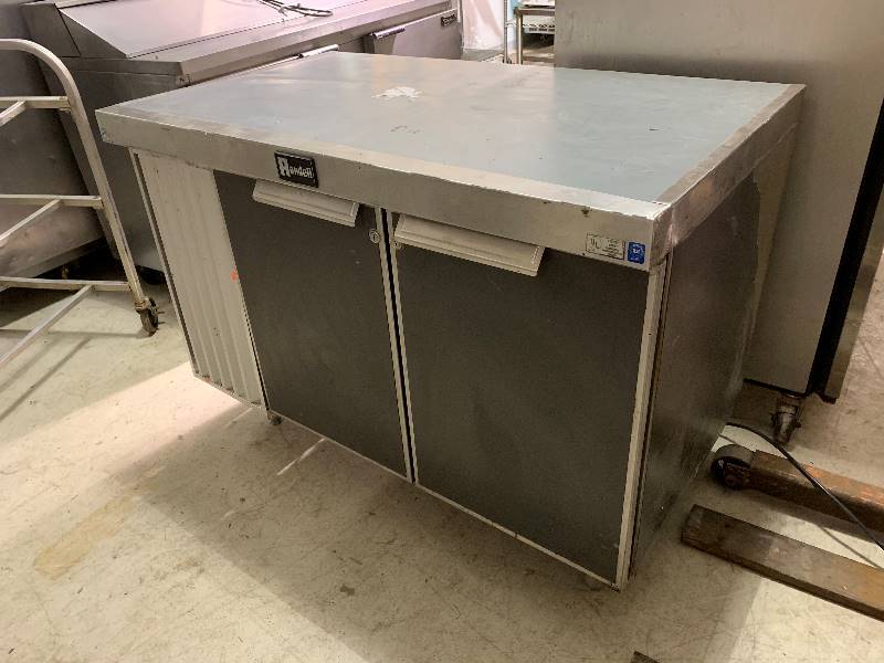 lot 13 image: Randell, under counter two door refrigerator, NSF, 115 volts, 48x28x35H.Runs Cools