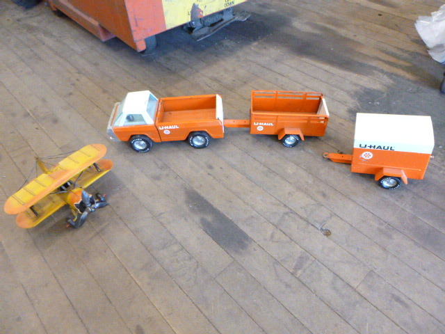 lot 113 image: U-Haul Truck and Airplane