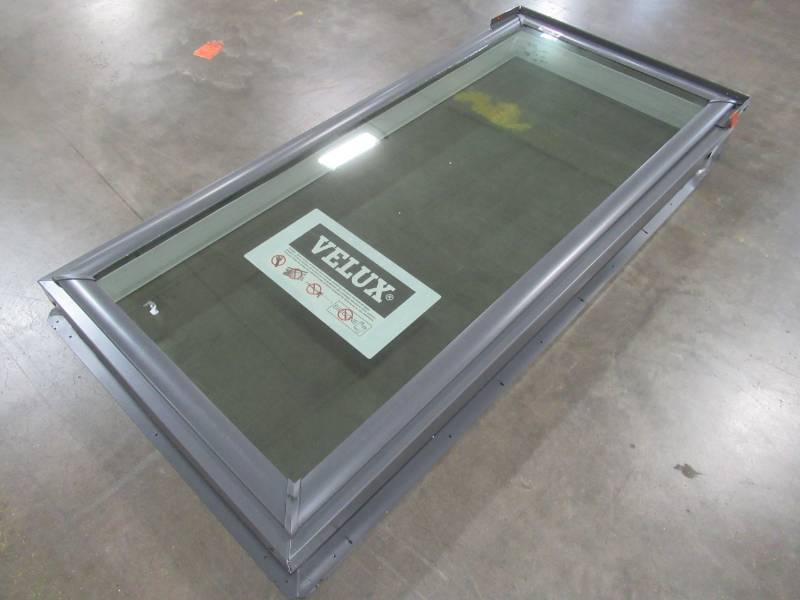 lot 1 image: VELUX Approximately 22-12 in. x 46-12 in. Fixed Pan-Flashed Skylight with Tempered Low-E3 Glass QPF 2246 2005.